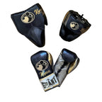 Grant navy lace-up boxing gloves with silver palms, shown with navy headgear and groin guard - close-up of logo and cuff