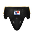 Winning black groin guard with yellow edge piping, wide waistband and padded cup, front view