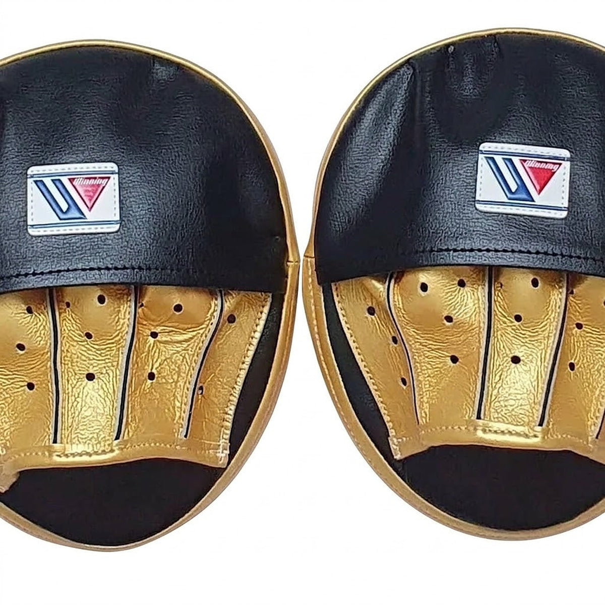 Pair of Winning black curved focus mitts with gold palm and gold rim around the striking face - palm side