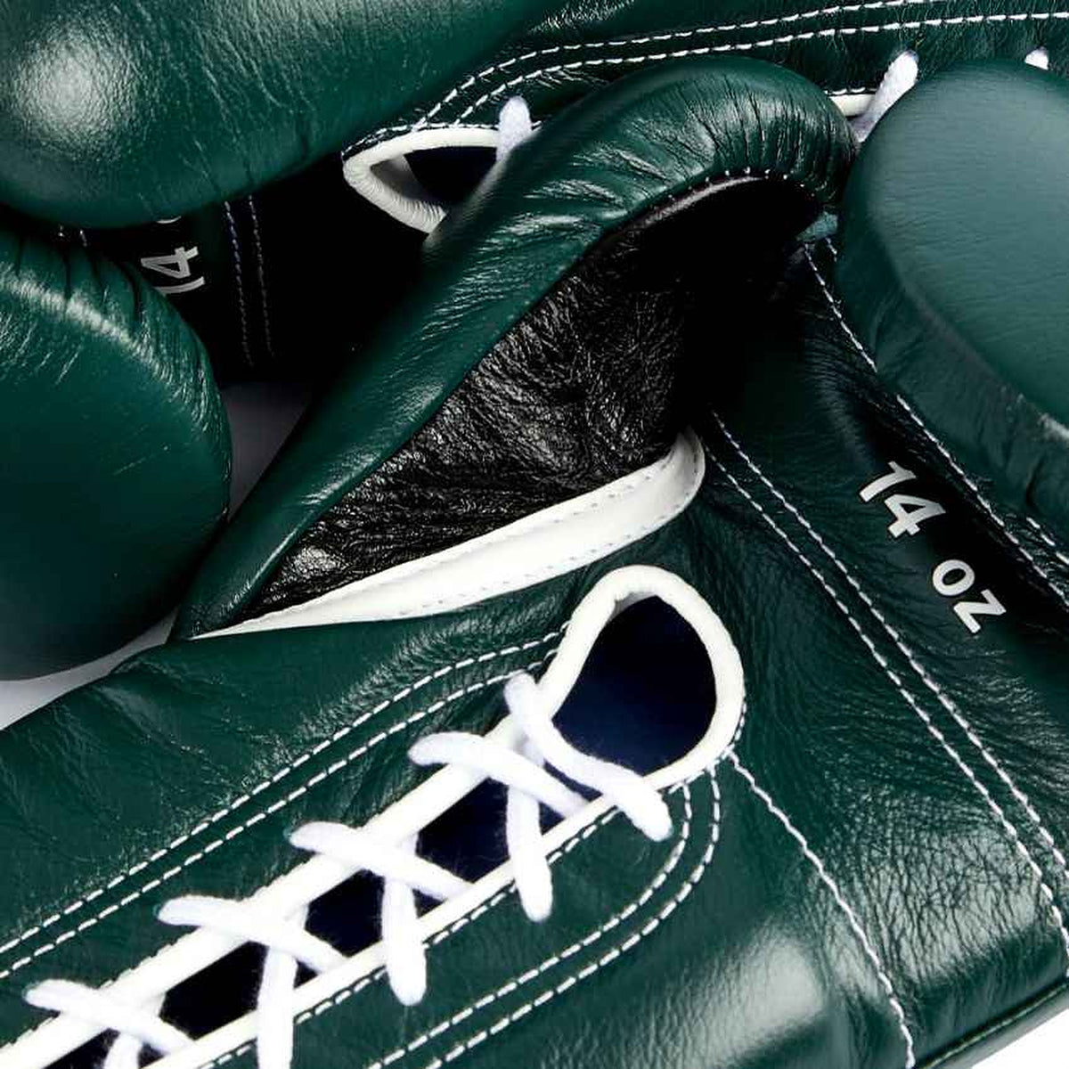 Winning MS-600 solid dark green boxing gloves with white laces - alternate angle
