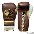 Grant chocolate brown boxing glove with gold cuff band, white thumb and sample El Azteca name print