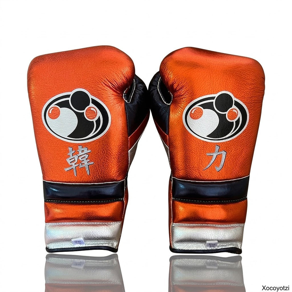 Grant metallic orange lace-up boxing gloves with silver cuffs alongside matching orange headgear - alternate angle