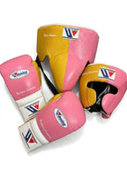 Winning boxing set with pink and white lace-up gloves, gold headgear and gold groin guard - palm and closure detail