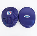 Winning deep indigo navy curved focus mitts with dark blue striking face, displayed as a matching pair