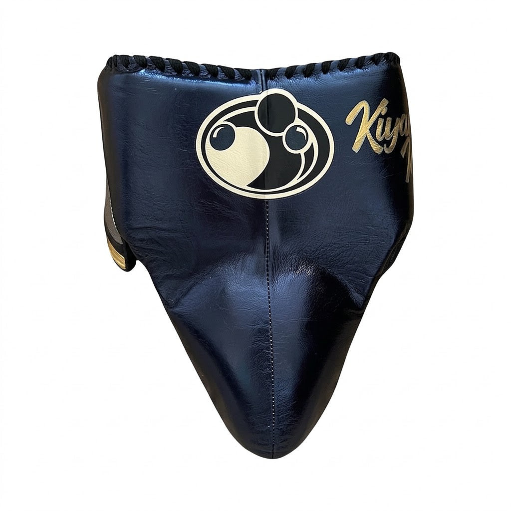 Grant navy lace-up boxing gloves with silver palms, shown with matching navy headgear and groin guard - alternate angle