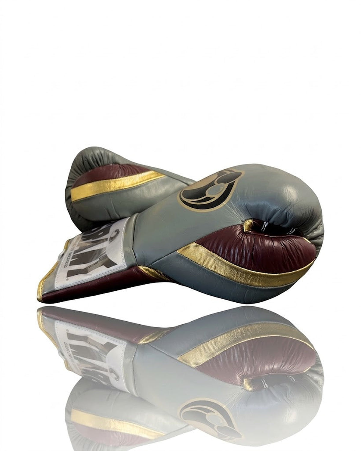 Grant boxing gloves with gray back, deep maroon palm and gold laces running down the palm side - side view