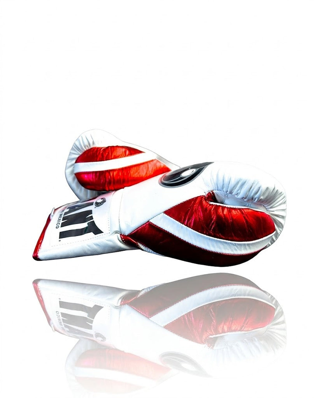 Grant white lace-up boxing gloves with thin red seam piping and a red trim around the cuff - side view