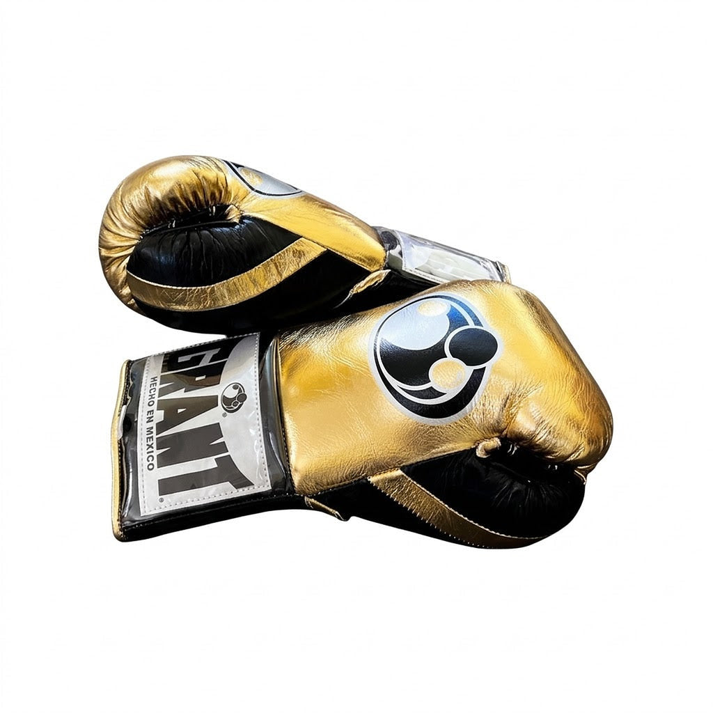 Grant metallic gold lace-up boxing gloves with black laces and black trim around the cuff