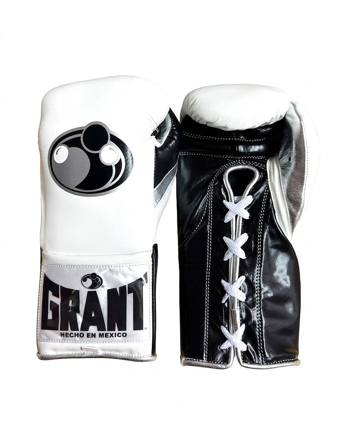 Grant boxing gloves with white back, black palm and white laces, classic two-tone lace-up design - close-up of logo and cuff
