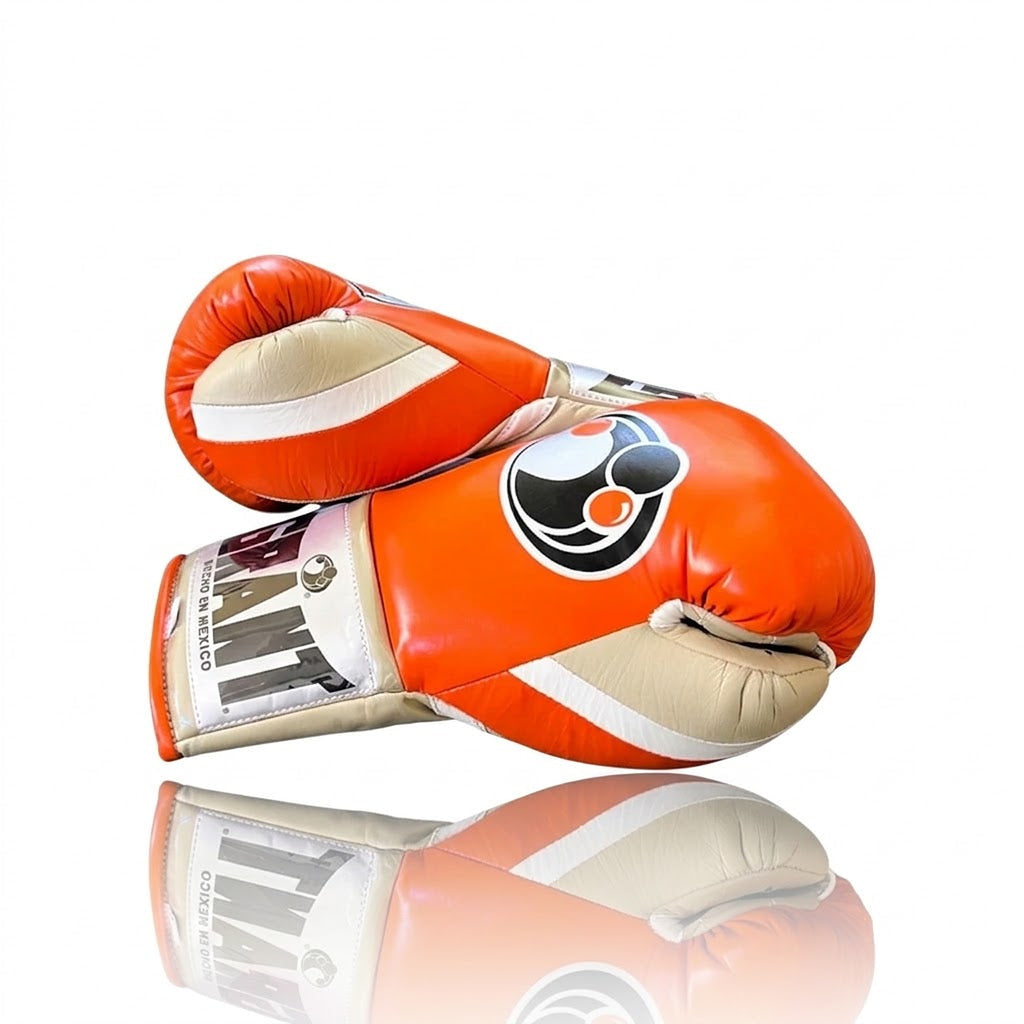 Grant boxing gloves with orange back, cream palm and matching orange laces in lace-up style - side view