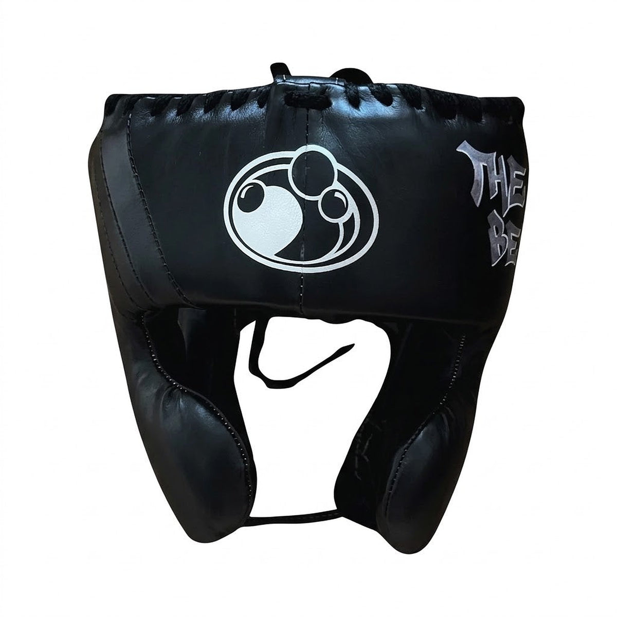 Grant all-black lace-up boxing gloves, black headgear and black groin guard laid out as a complete set - alternate angle