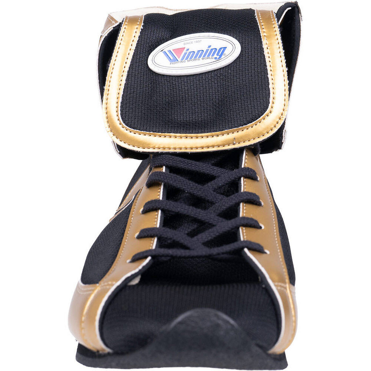 Close-up of the oval Winning patch on the black fold-over collar of the gold FOLD Type shoe