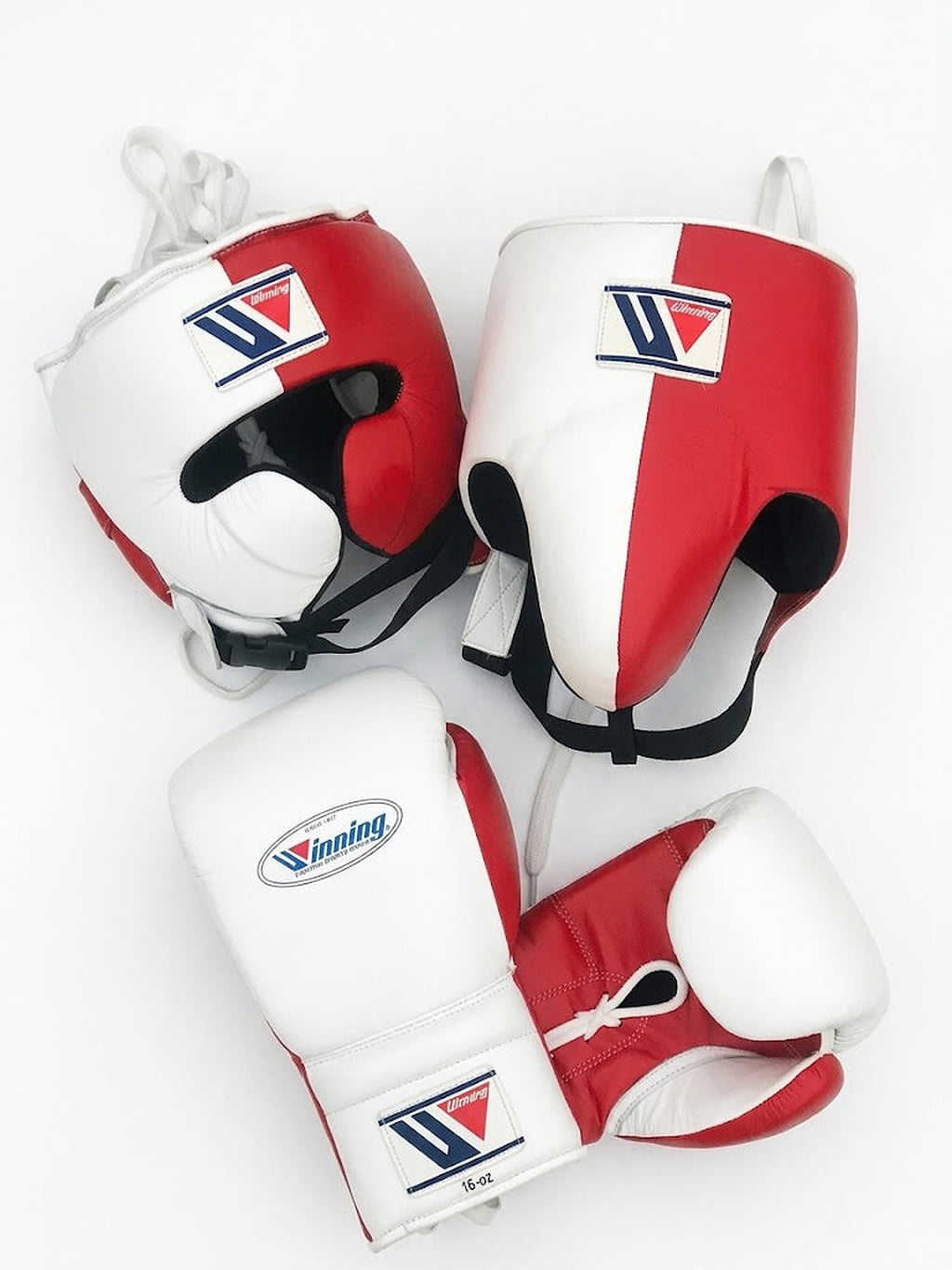 Winning red and white split boxing set with lace-up gloves, headgear and groin guard, W triangle logo - side view