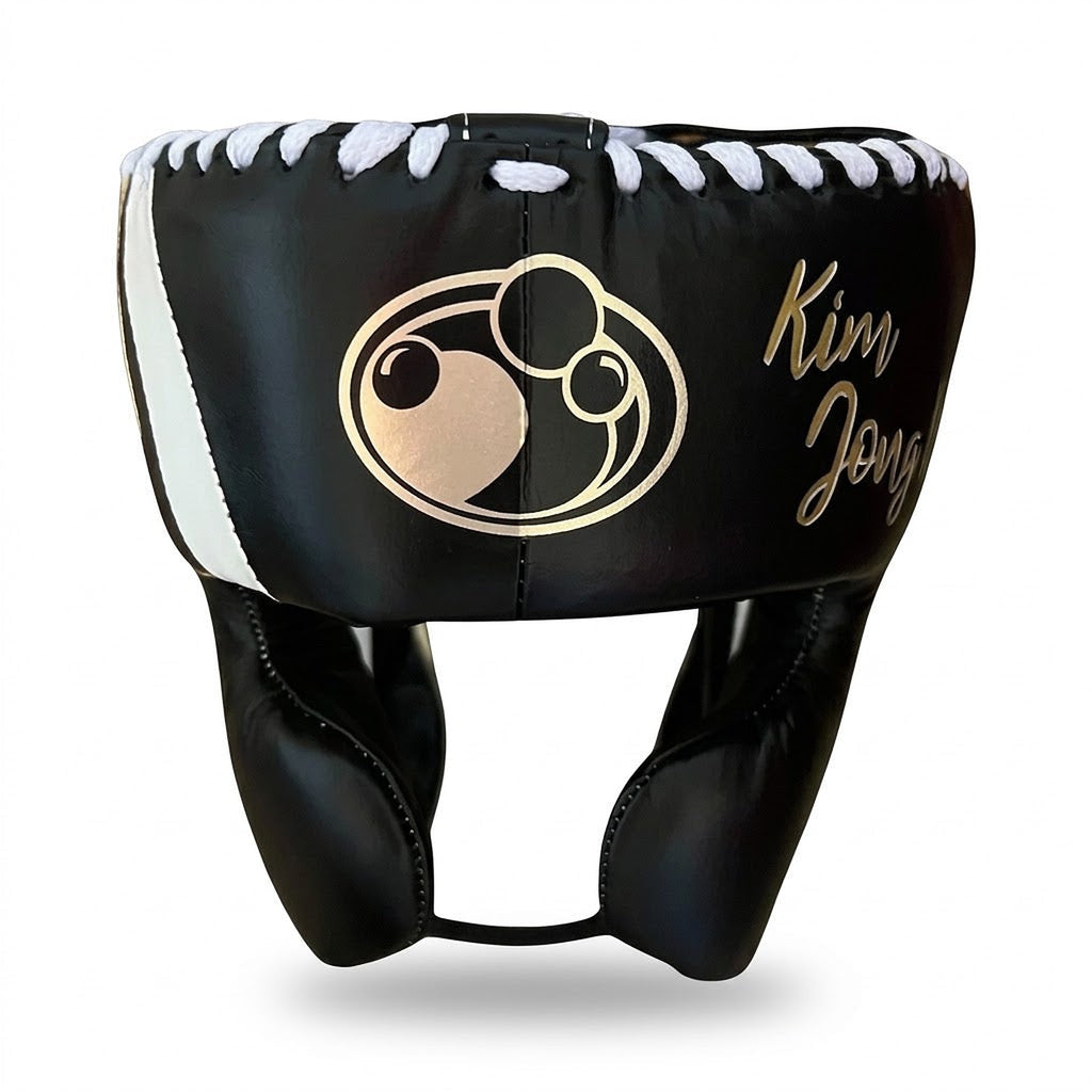 Grant navy lace-up boxing gloves with silver palms, shown with navy headgear and groin guard - palm and closure detail