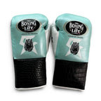 No Boxing No Life mint blue lace-up boxing gloves with black crocodile-embossed cuff and mascot logo