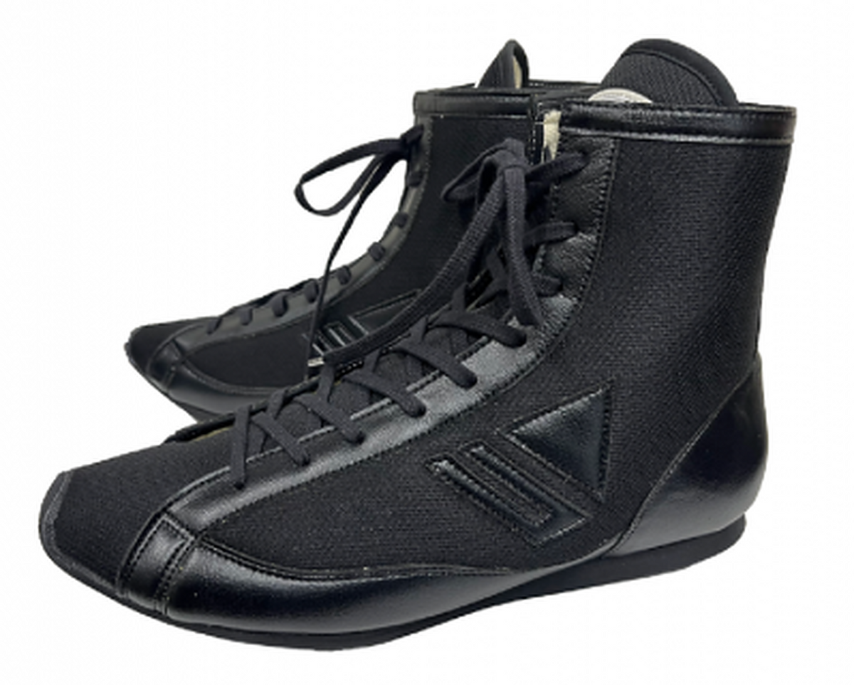 Winning RS-100 black boxing shoe at a three-quarter angle showing the high-top collar