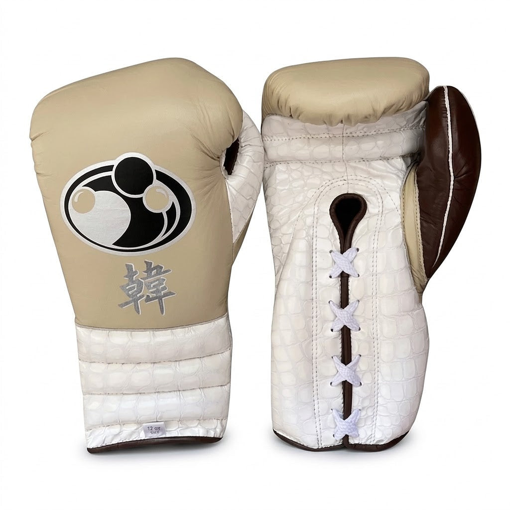 Grant boxing set in cream beige with lace-up gloves and matching headgear showing the round Grant logo - side view