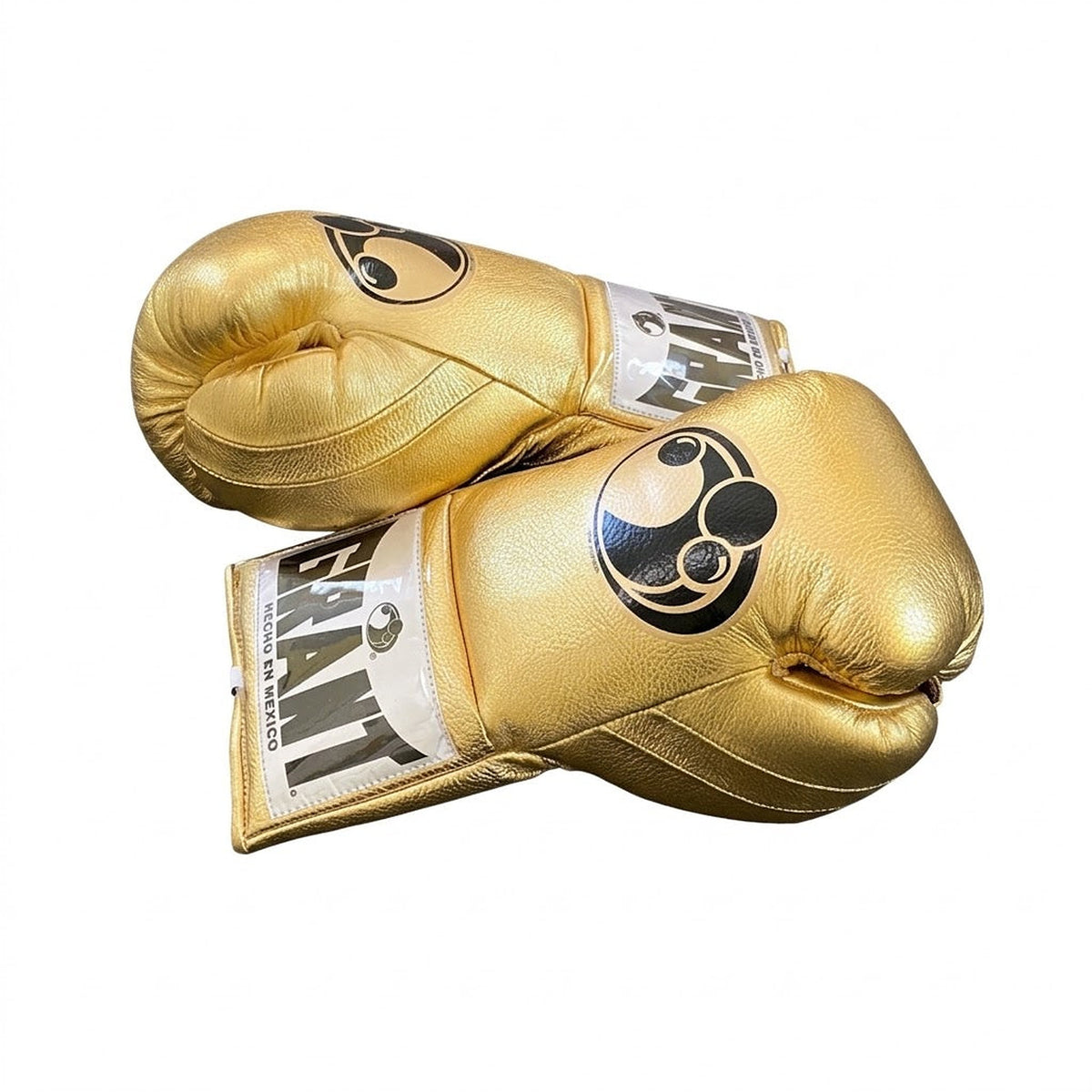 Grant boxing gloves finished in full metallic gold with white laces down the palm - side view