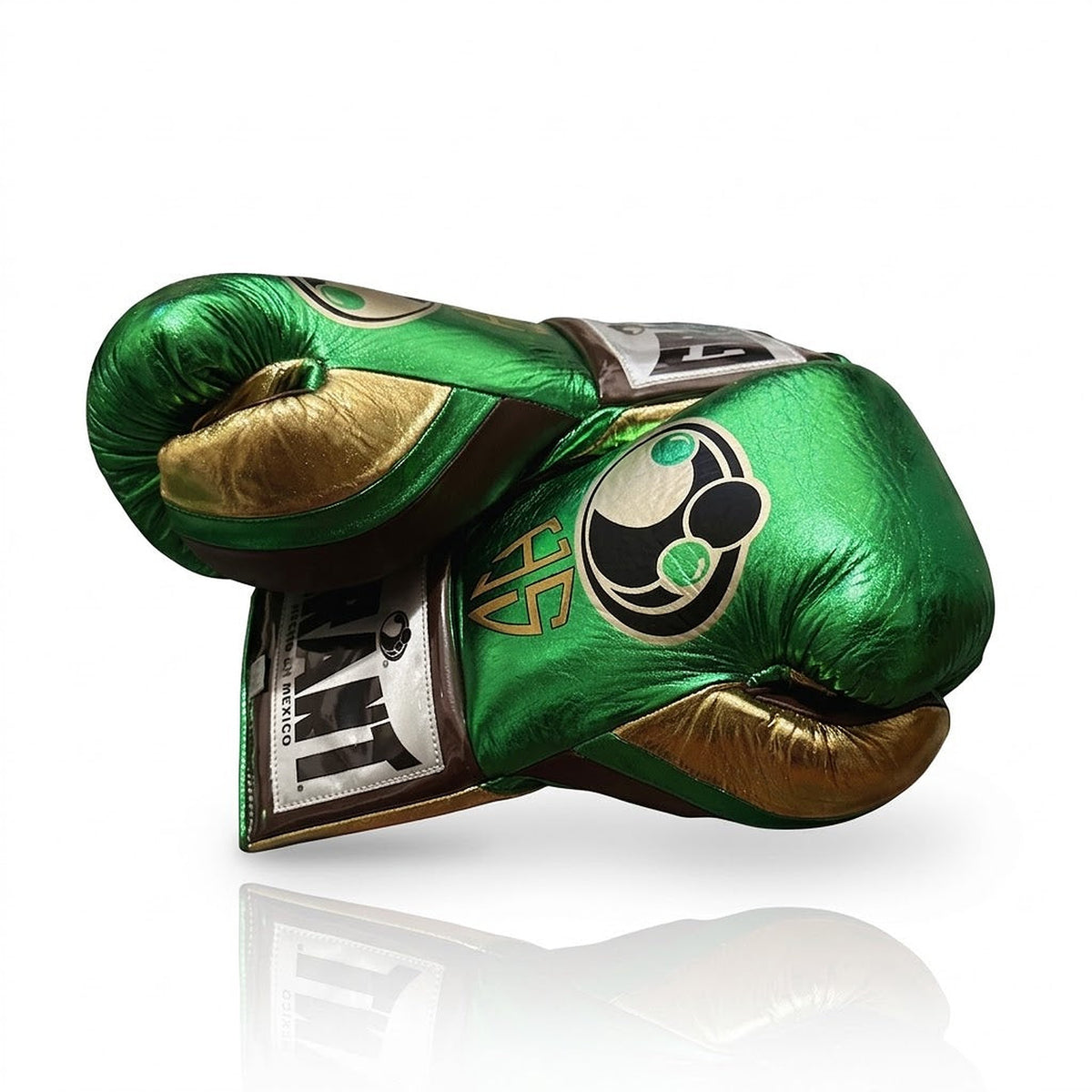 Grant metallic green lace-up boxing gloves with gold palms, plus green headgear and groin guard - close-up of logo and cuff
