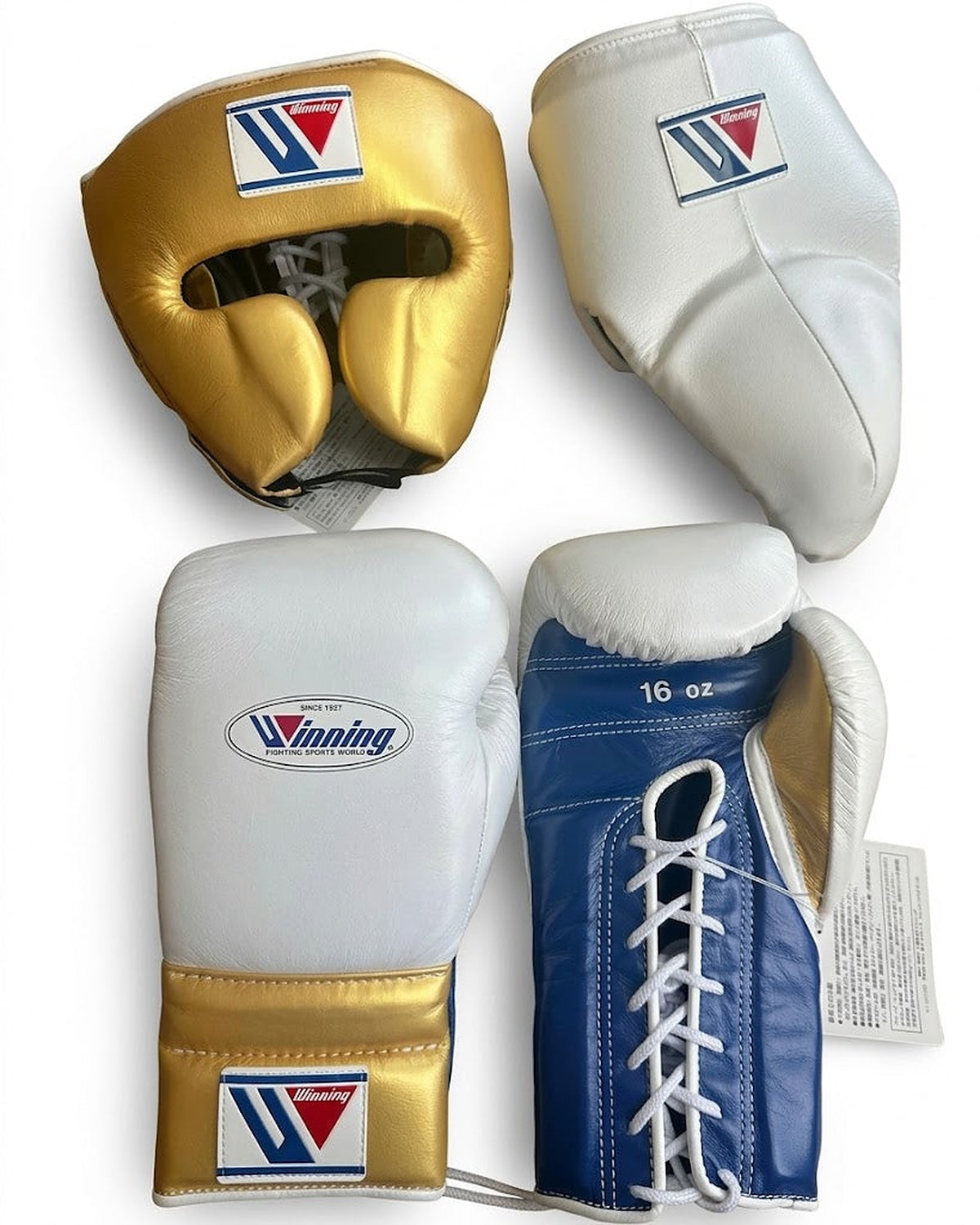 Winning set with metallic gold headgear, white groin guard and white and navy gloves with gold cuff