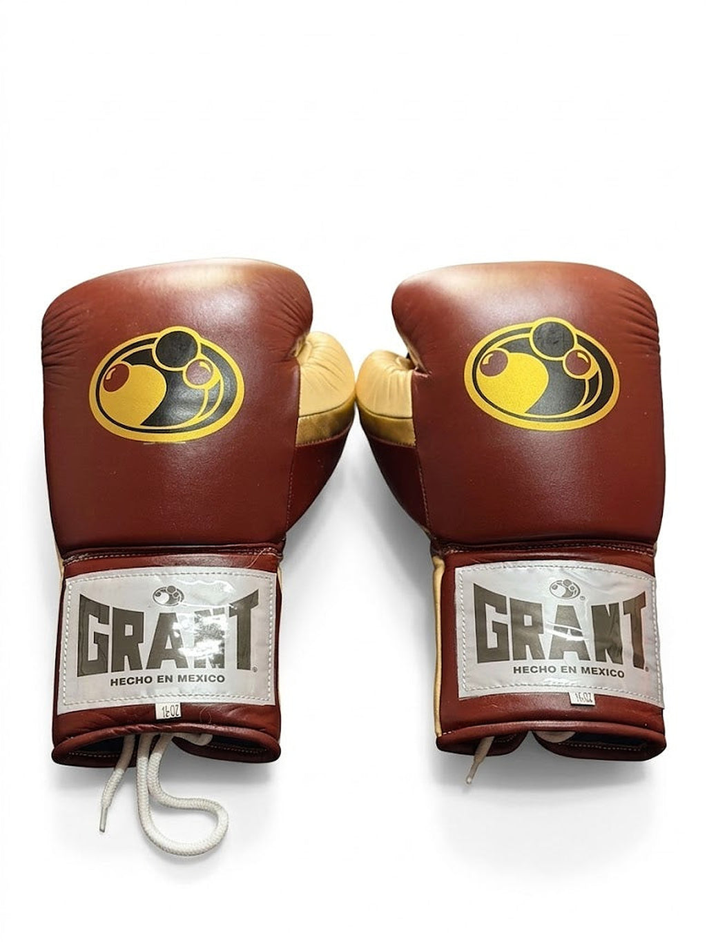 Grant chocolate brown boxing gloves with cream palm and white laces giving a vintage lace-up look - palm and closure detail