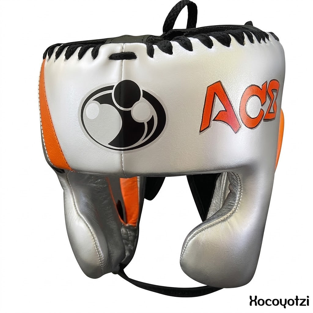 Grant white lace-up boxing gloves with black palms and orange trim, plus matching headgear - side view