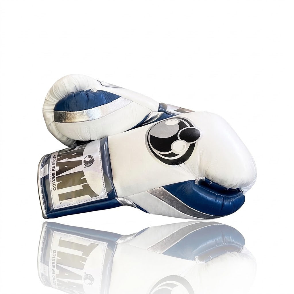 Grant boxing gloves with white back, navy blue palm and white laces, shown in lace-up fight style - side view