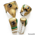 Grant metallic gold lace-up gloves, headgear and groin guard trimmed in green and white along the edges