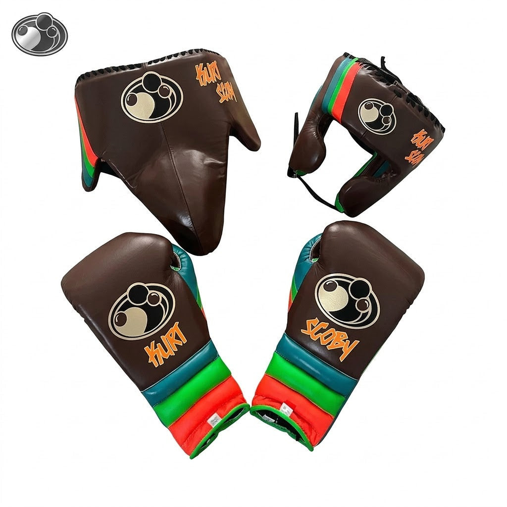 Grant brown lace-up boxing gloves, headgear and groin guard with orange, green and red striped cuffs