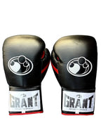 Grant all-black lace-up boxing gloves with red laces down the palm and red inner lining visible - alternate angle