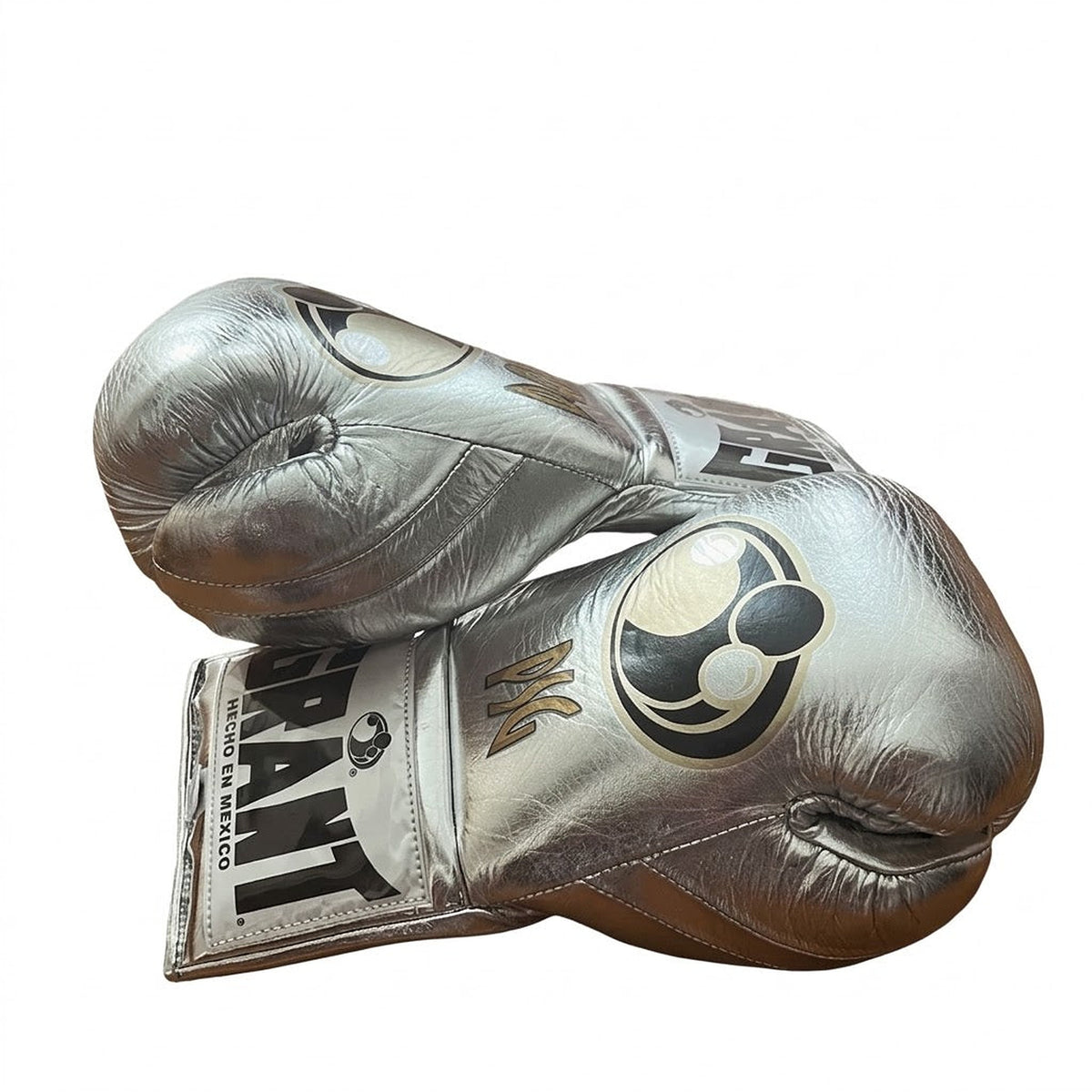 Grant champagne silver metallic lace-up boxing gloves with white laces and sample initials on the back - side view