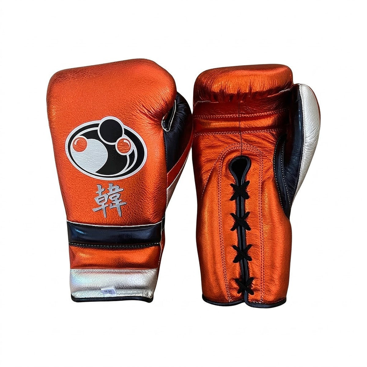 Grant metallic orange lace-up boxing gloves with silver cuffs alongside matching orange headgear - side view