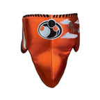 Grant metallic orange lace-up gloves with silver GRANT cuff patch, matching orange headgear and groin guard - alternate angle