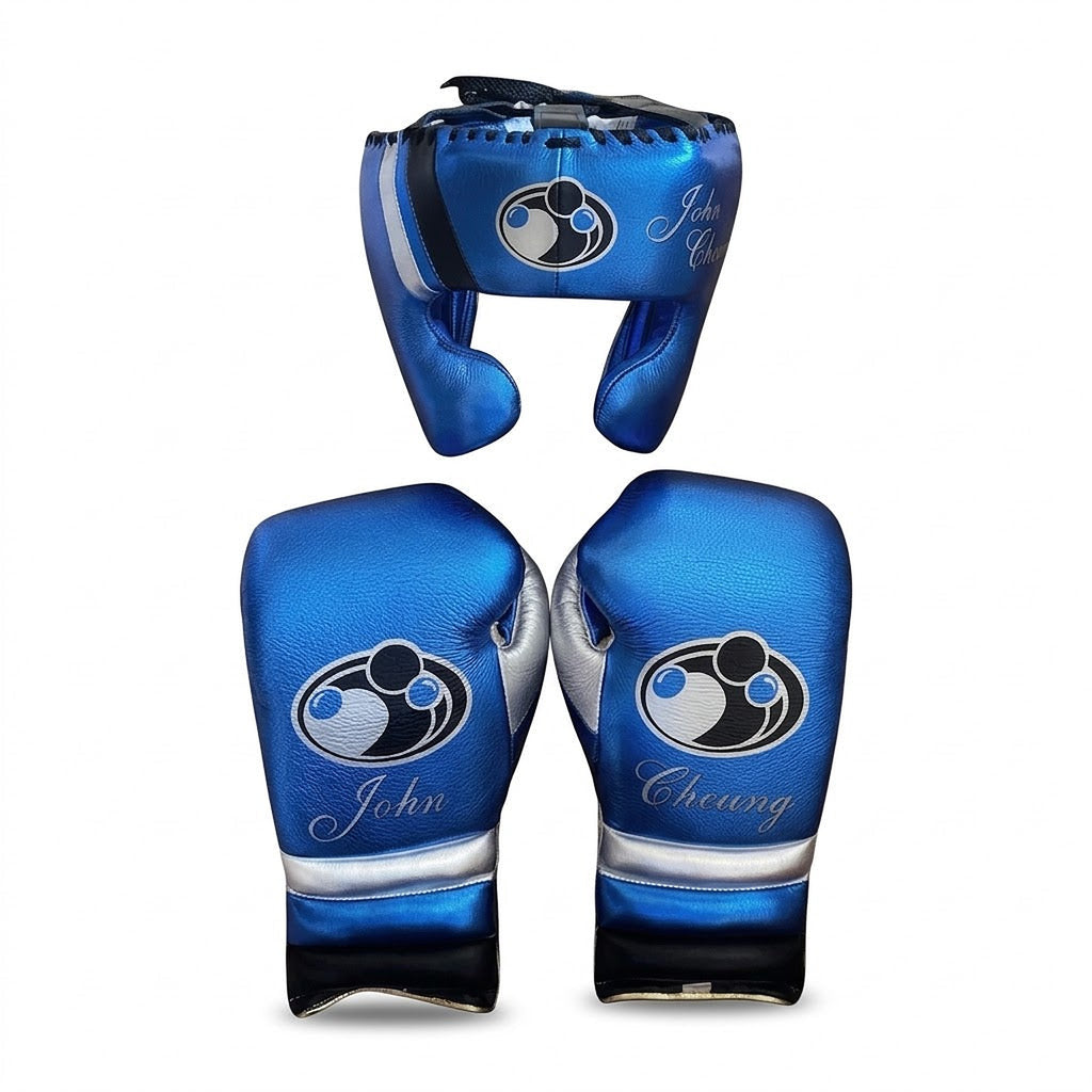 Grant metallic blue boxing set with silver trim on lace-up gloves and matching headgear