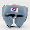 Winning light gray-blue cheek-protector headgear in a soft, muted tone with forward-wrapping cheek pads