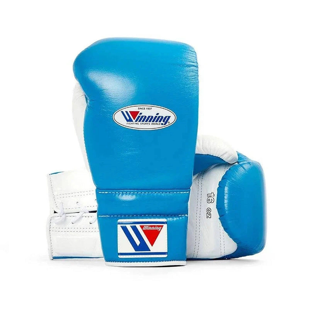 Winning sky blue and white split boxing set with lace-up gloves, headgear and groin guard - side view