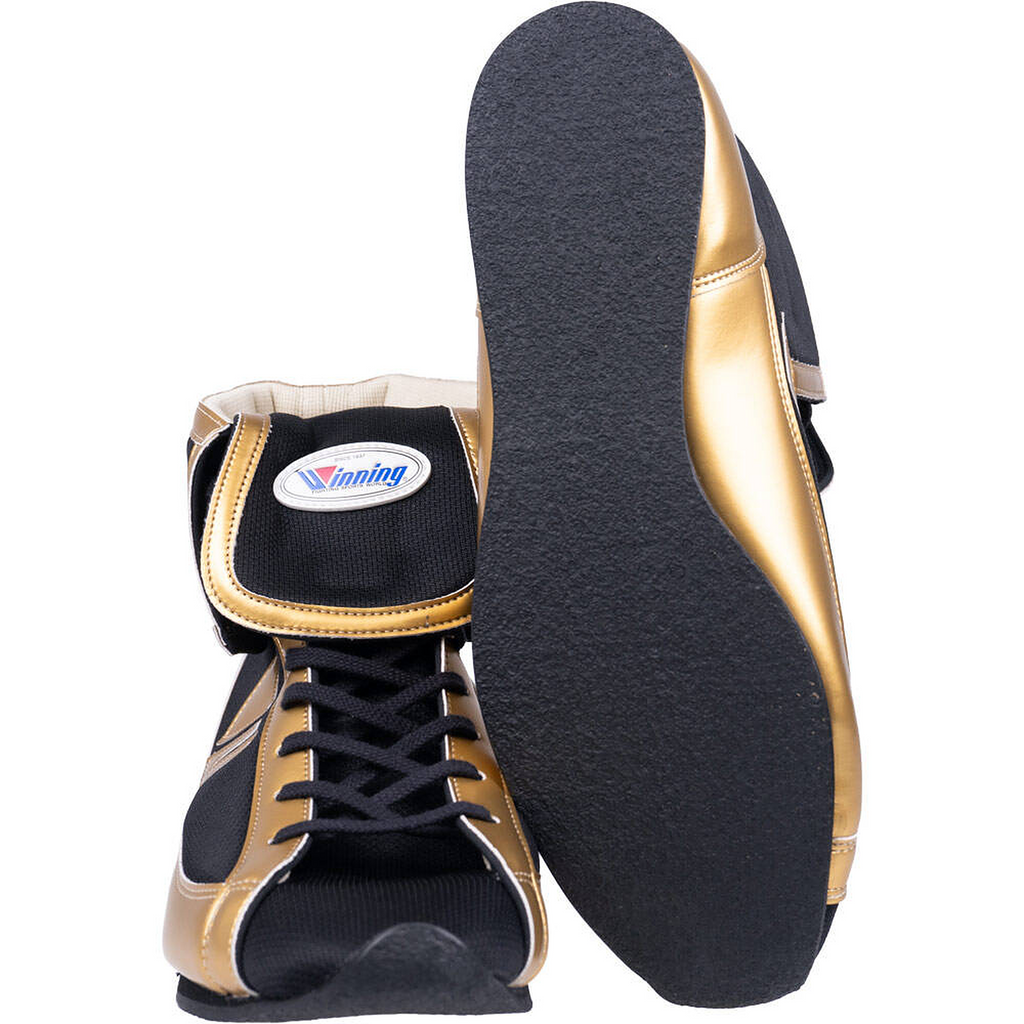 Winning FOLD Type black and gold boxing shoes showing the black rubber sole and folded collar
