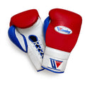 Winning Velcro boxing glove with red back, white palm and royal blue thumb matching the W triangle logo