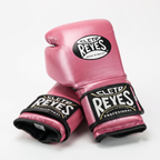 Cleto Reyes glossy pink boxing gloves side by side showing brand patches on the back of the hand