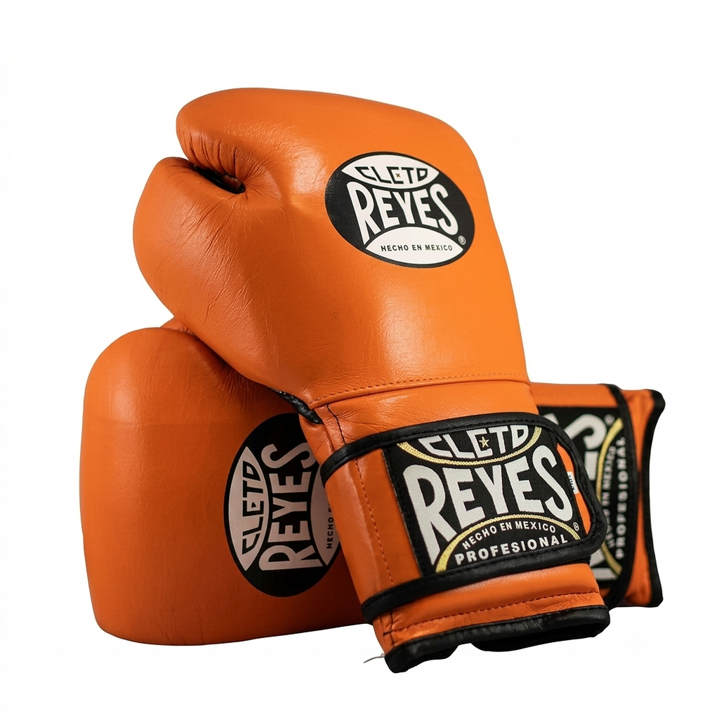 Pair of Cleto Reyes orange leather boxing gloves showing brand logo patches on the back of the hand