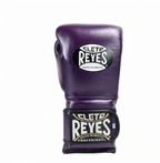 Single Cleto Reyes metallic purple leather boxing glove with brand logo on the black wrist strap