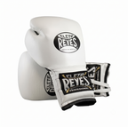Cleto Reyes white leather boxing gloves side by side showing brand logo patches