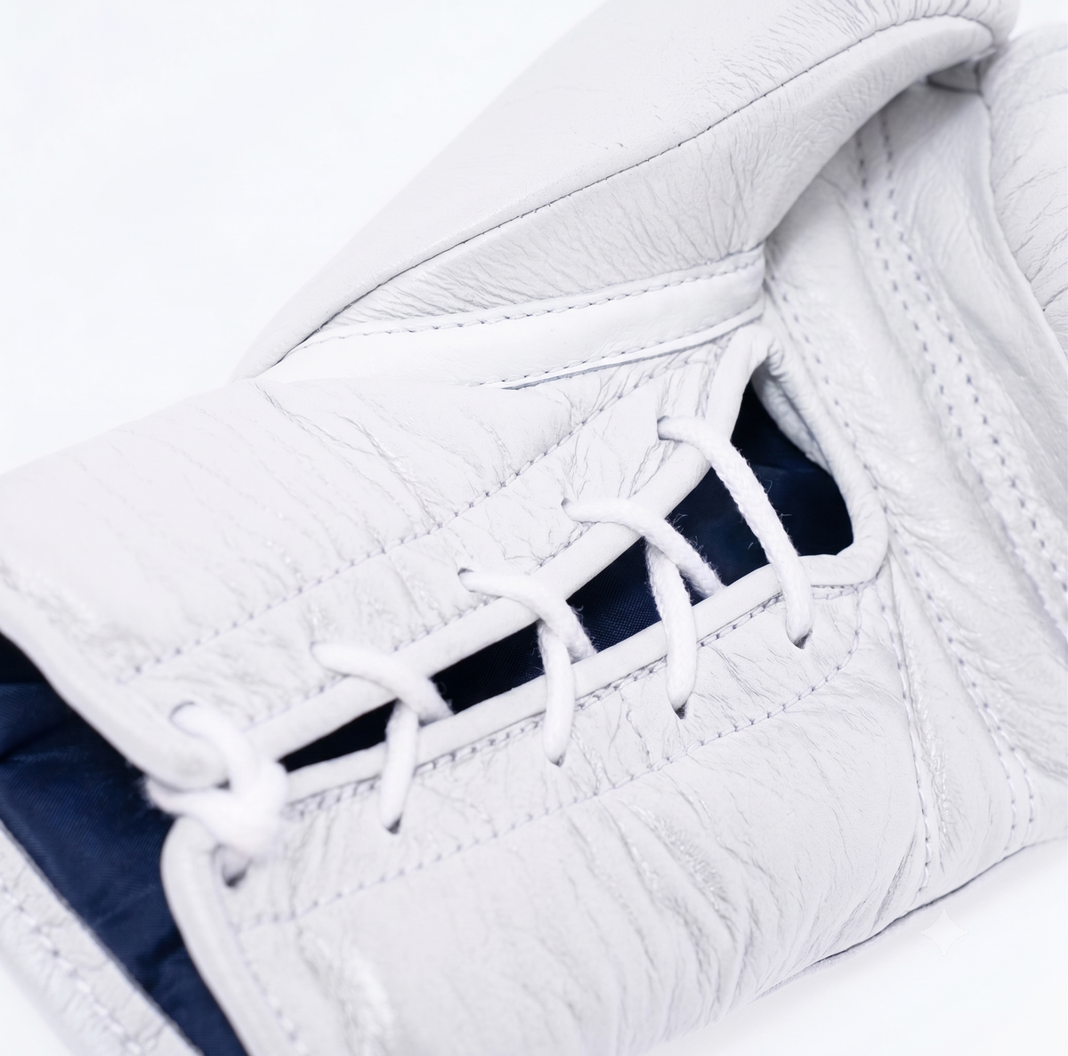 Winning MS-600 lace-up boxing glove in full white leather with the red, white and blue W logo - side view