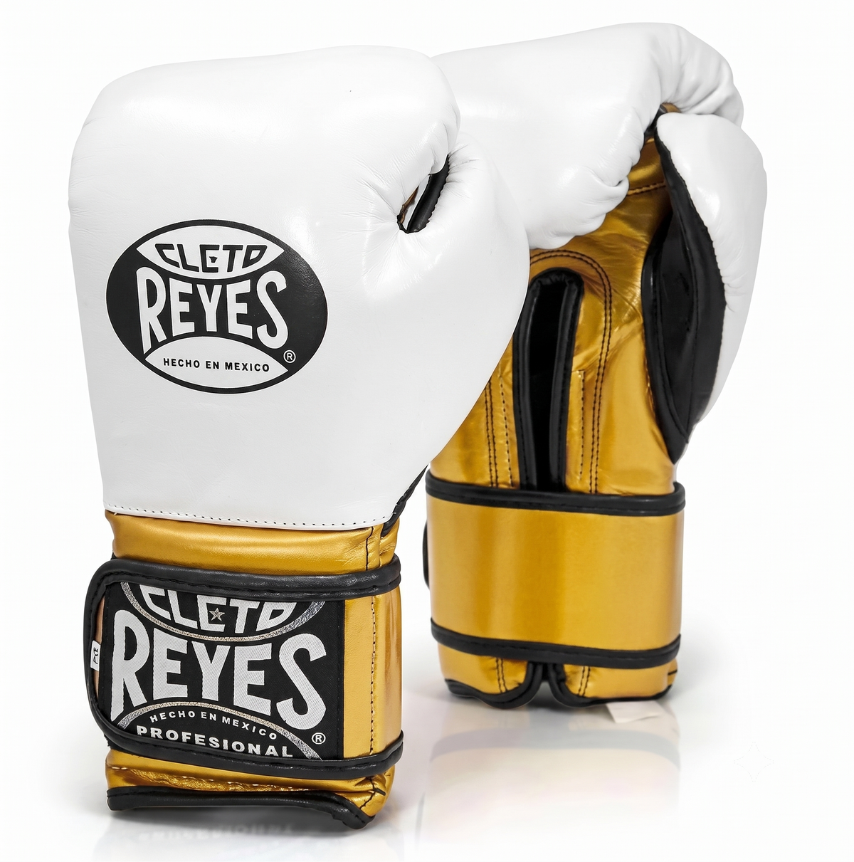 Cleto Reyes white boxing gloves with metallic gold cuff and gold hook-and-loop strap