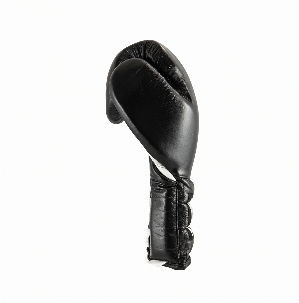 Cleto Reyes black leather boxing glove from the side with white palm lining visible