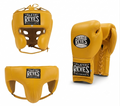 Cleto Reyes golden yellow boxing set with lace-up gloves, cheek-protector headgear and groin guard