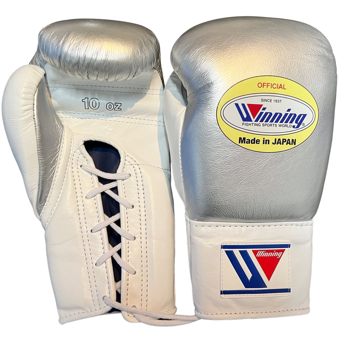 Winning lace-up boxing glove with metallic silver back and cream-white palm and cuff in a light finish