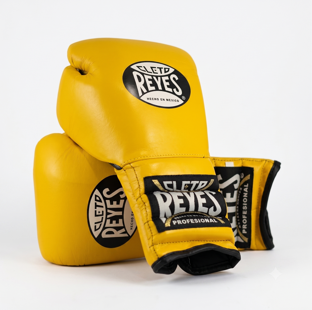 Three Cleto Reyes yellow boxing gloves stacked showing brand logo on knuckle and wrist