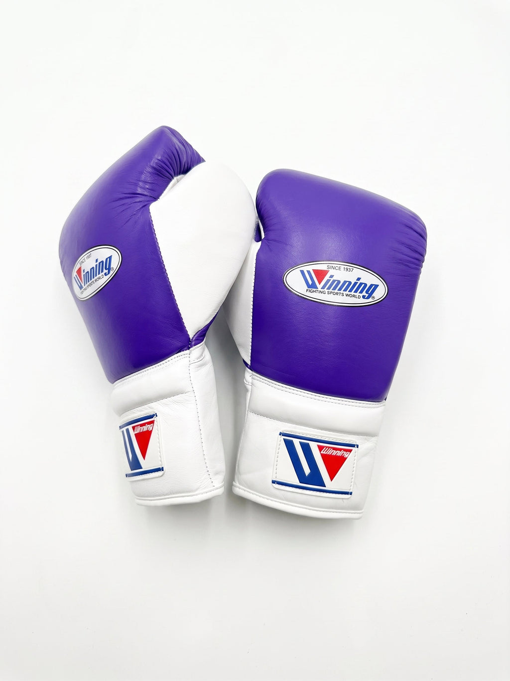 Winning lace-up boxing glove with lavender purple back, white palm and white cuff in a soft pastel finish - side view