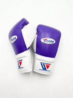 Winning lace-up boxing glove with lavender purple back, white palm and white cuff in a soft pastel finish - side view